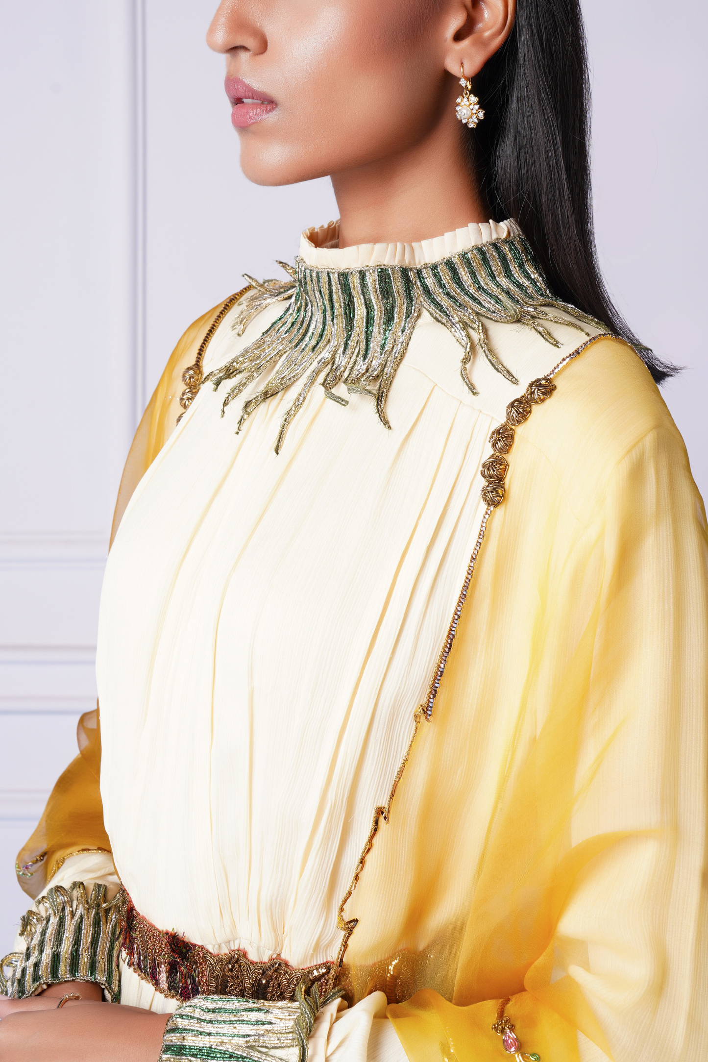 Close-up of dual-tone metallic embroidery detail on the Rumi gown for women