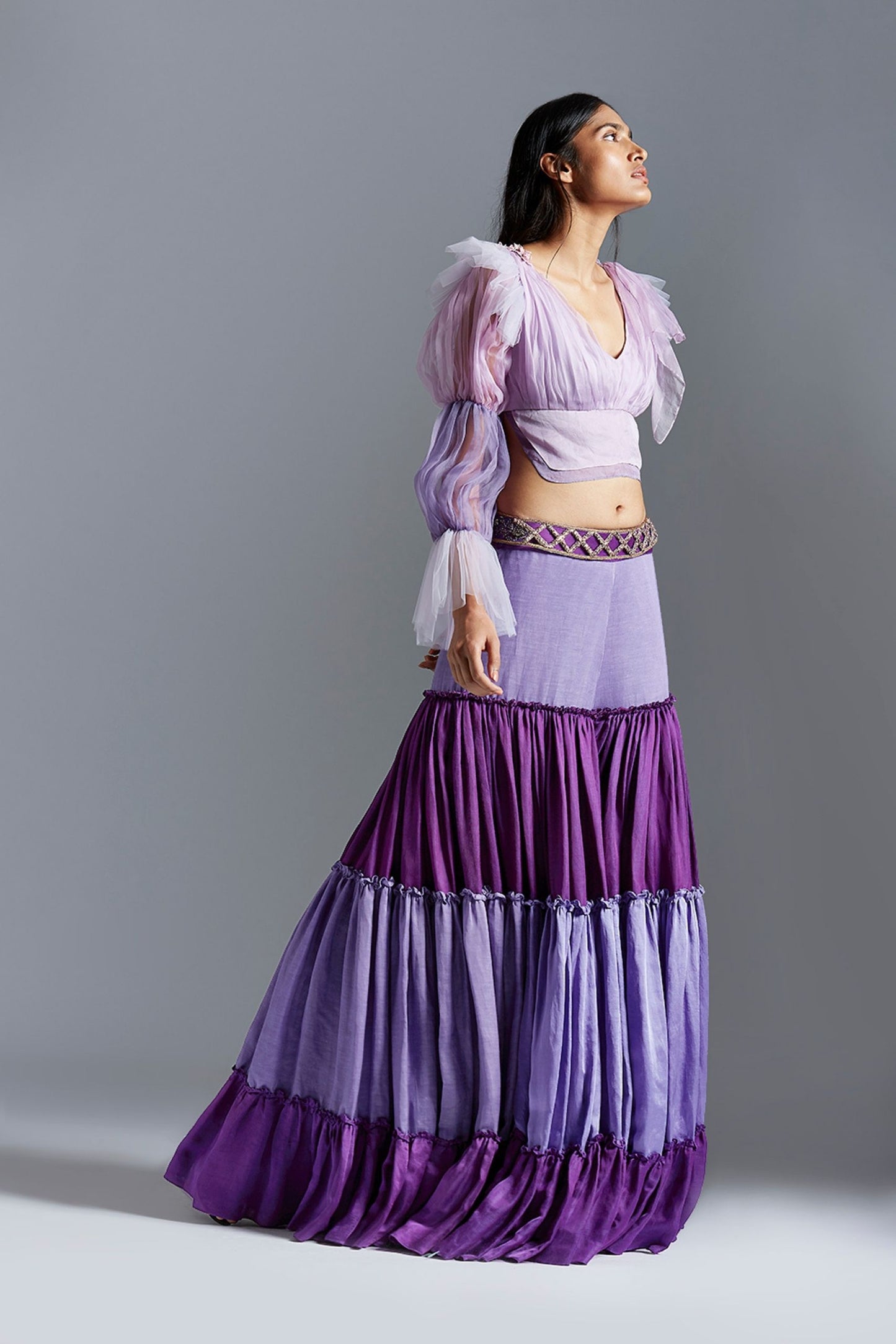 Full view of the blouse and sharara dress with dupatta, highlighting the stylish colorblocked sharara and luxe satin fabric