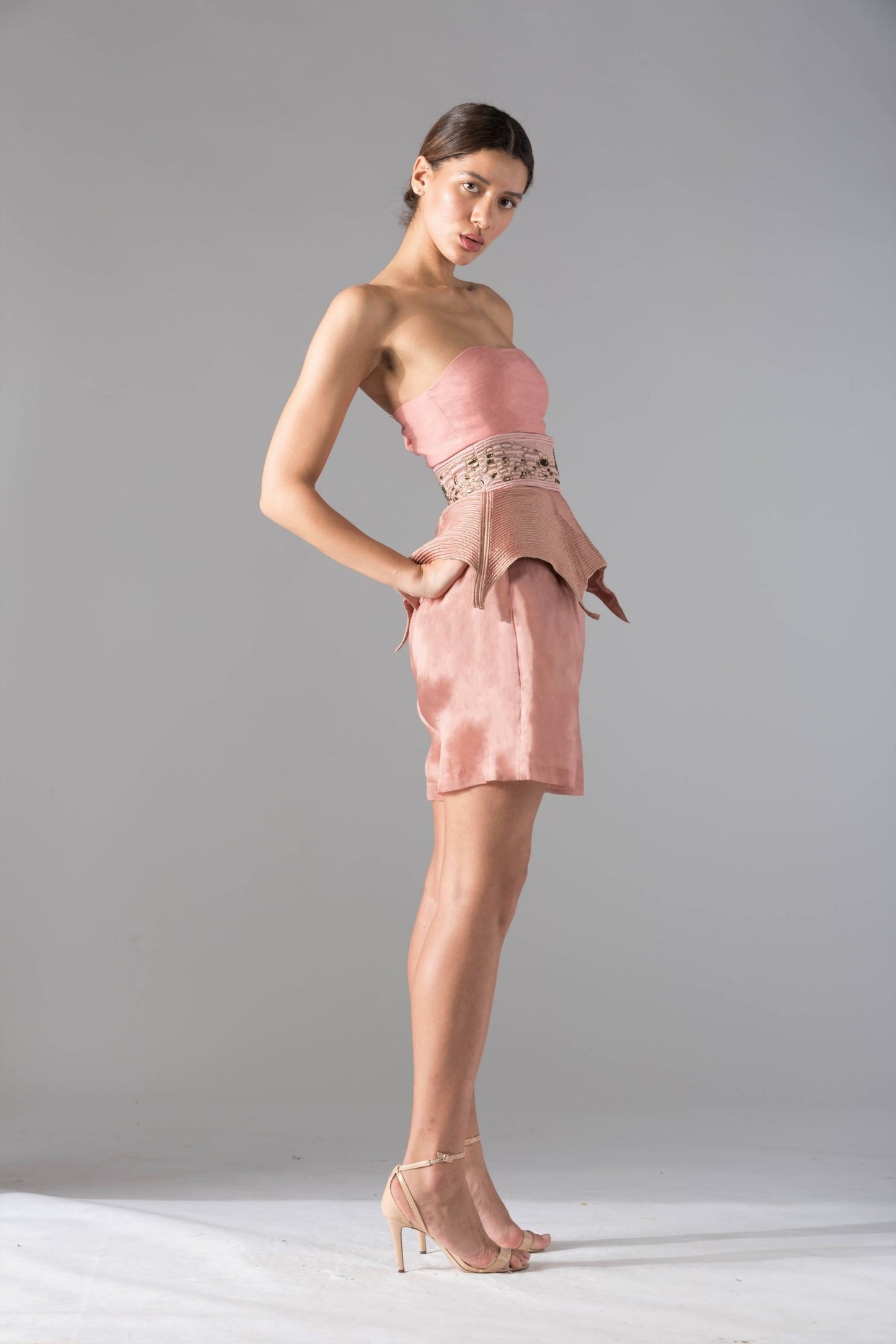Side view of the Frog Belt Bermuda with cullotes, emphasizing the modern silhouette and the unique style of the shorts