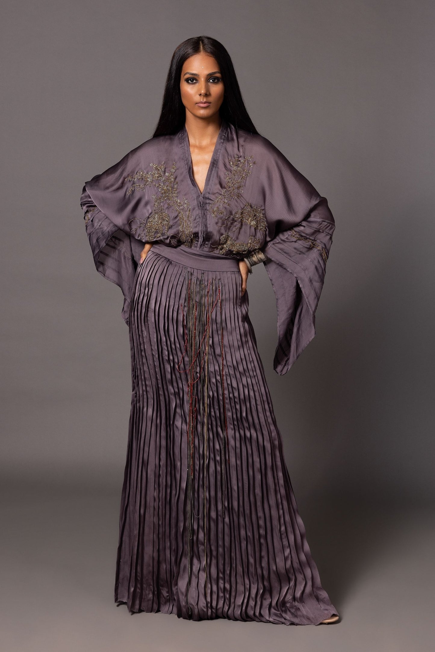 Shikhar Baugh Charcoal Kimono Top with Jaipur motifs, paired with a hand-pleated skirt, perfect for women seeking unique, custom clothing