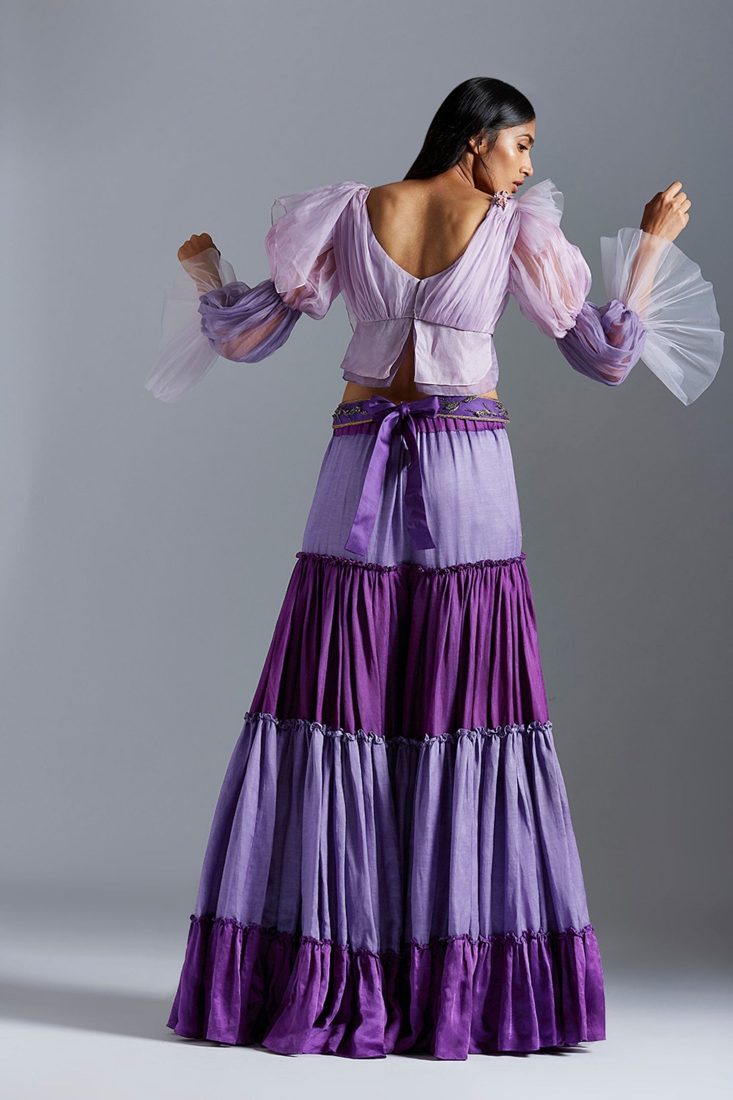 Back view of the blouse with sharara dress and dupatta, emphasizing the design of the sharara and flowing dupatta