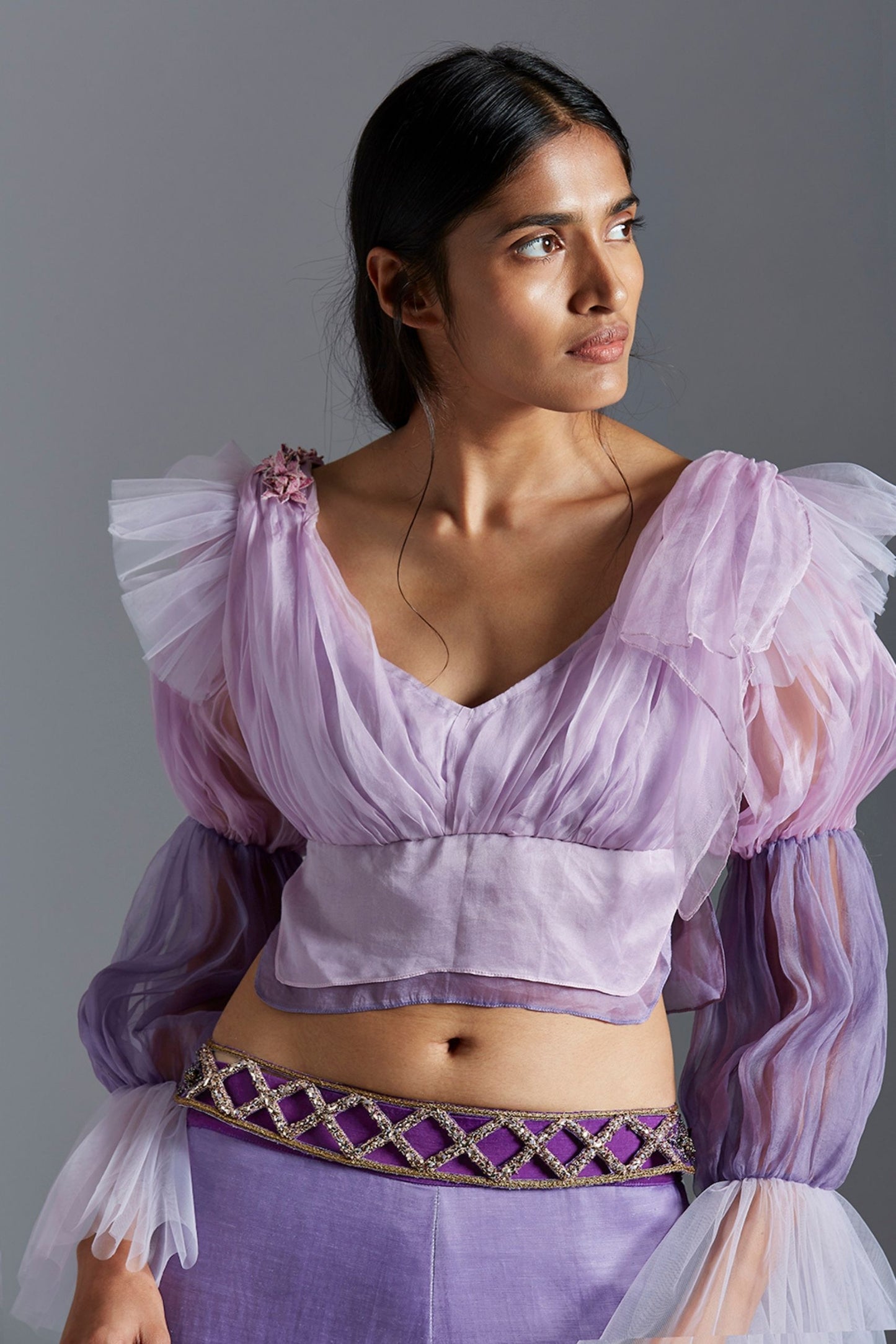Close-up of the handmade textures and detailing on the blouse and colorblocked sharara in satin fabric