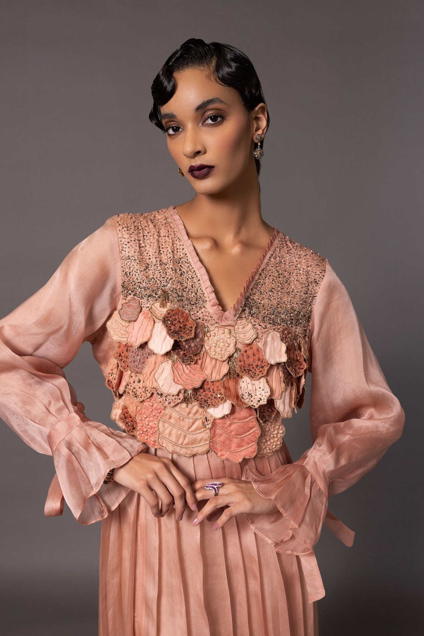 Close-up of the 3D hand-embroidered leaves on the Mima Mounds Pink Gown, showcasing the intricate detailing