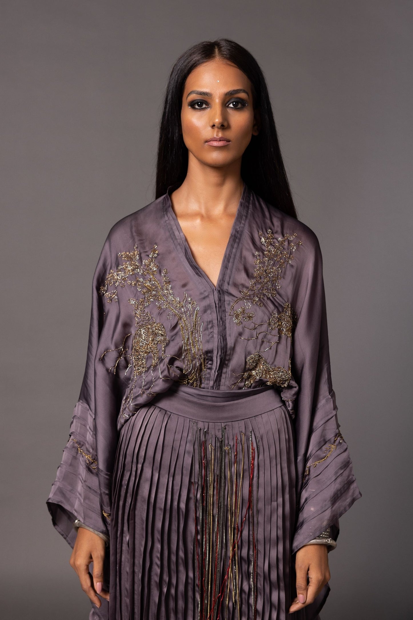 Focused view of the detailed Jaipur motifs on the embroidered Kimono Top paired with the pleated skirt