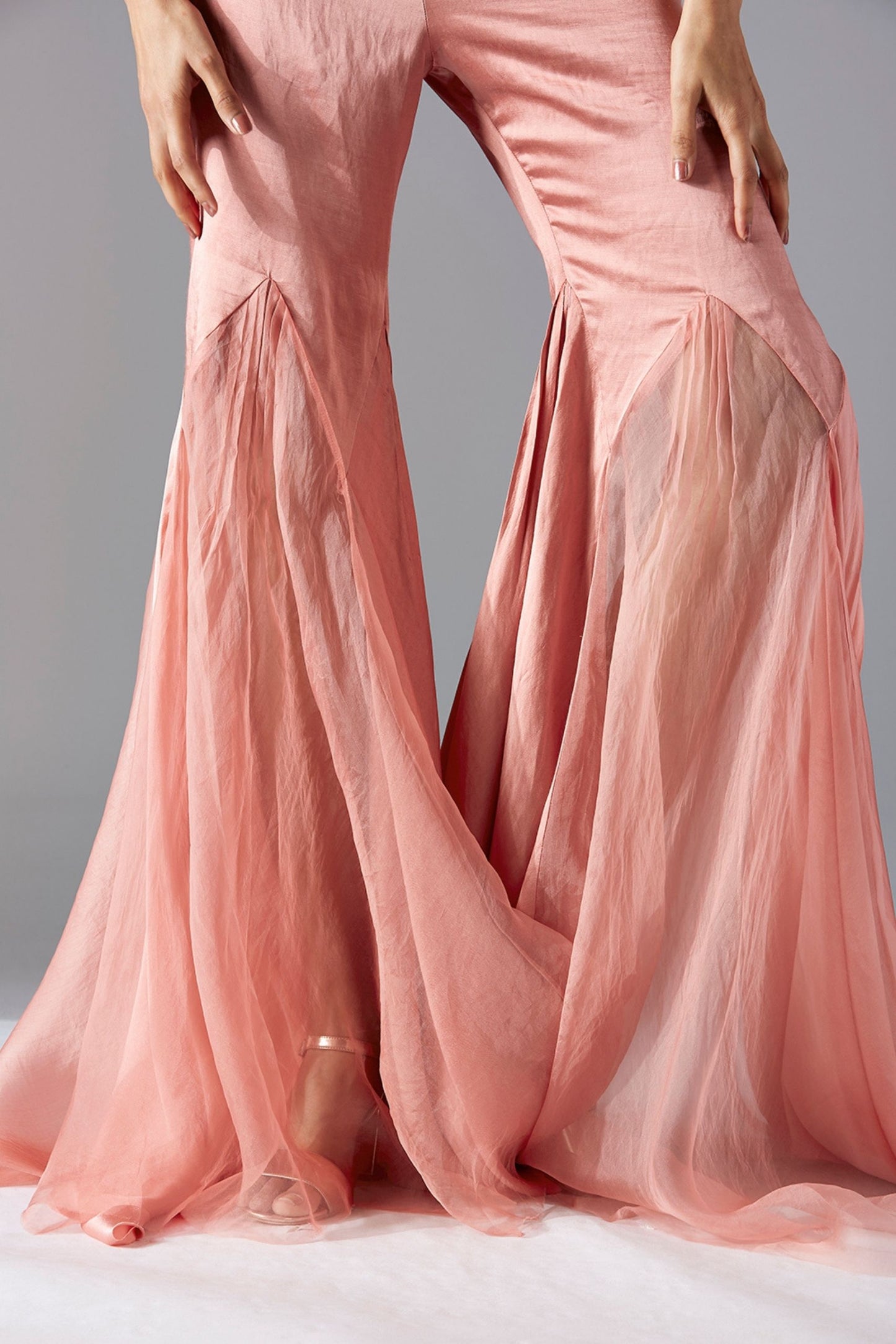 Flared trail pants for women in satin organza with elegant fabric manipulation