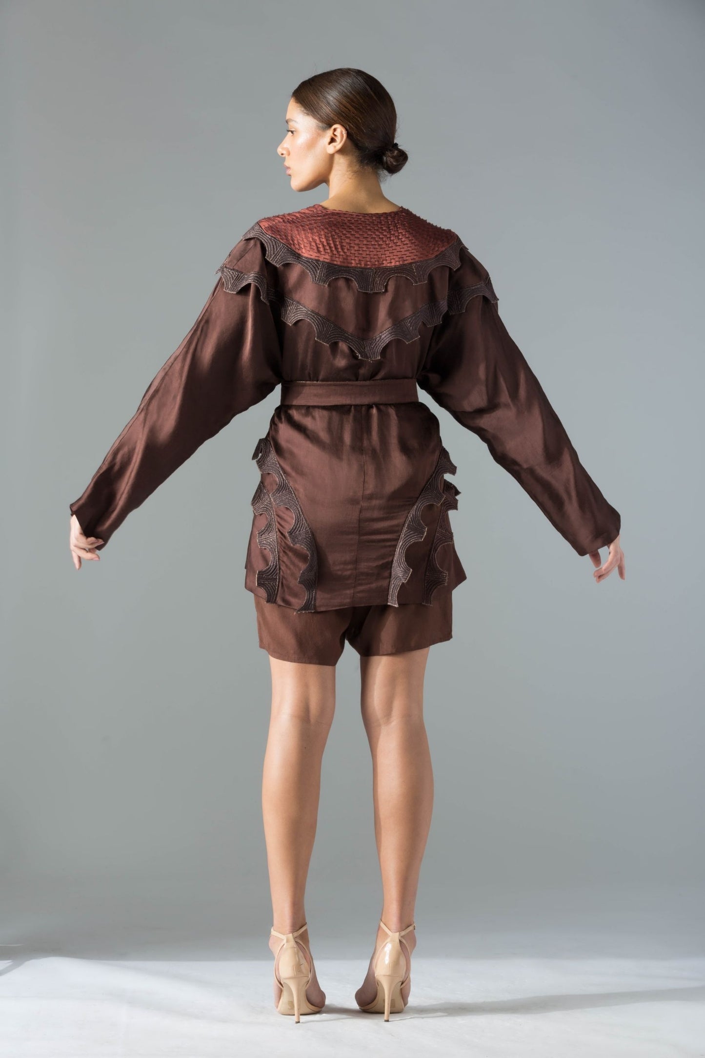 Back view of the satin robe for women, highlighting the elegant tieable belt and smooth satin finish