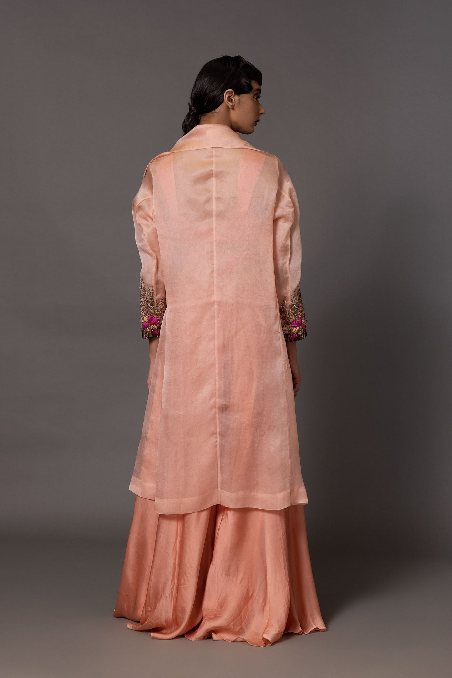 Back view of the Minakari Pink Carpet Embroidered Jacket for Women, displaying the back design and embroidery craftsmanship