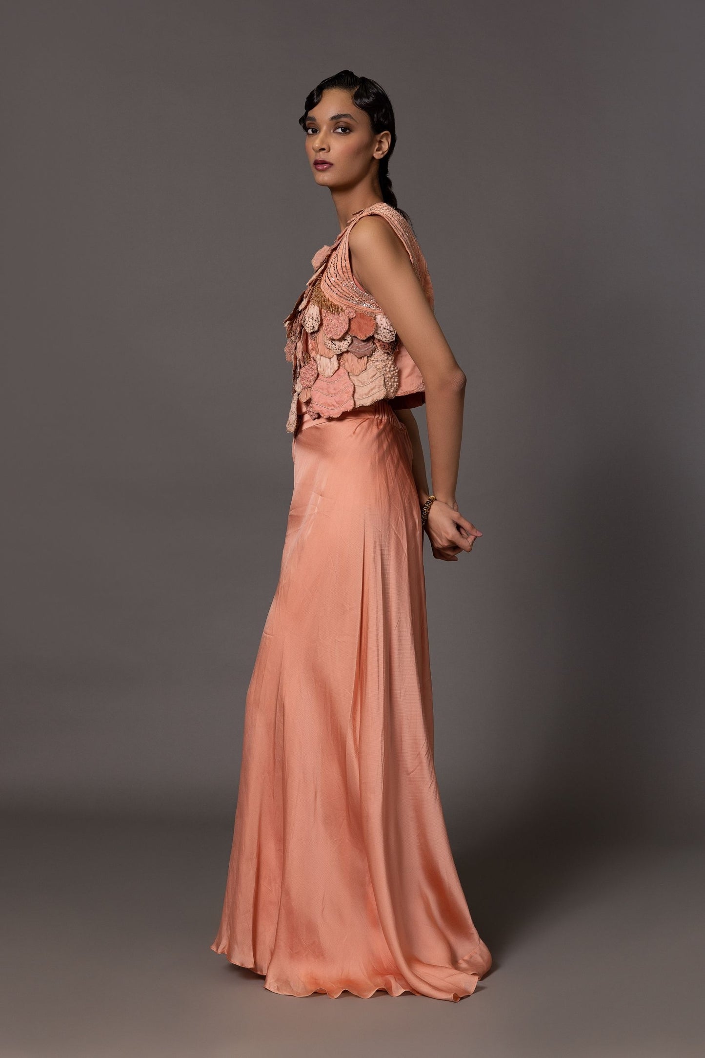 Side view of the Mima Mounds Pink Blouse and Flared Pant Set, emphasizing the silhouette and stylish fit of the outfit