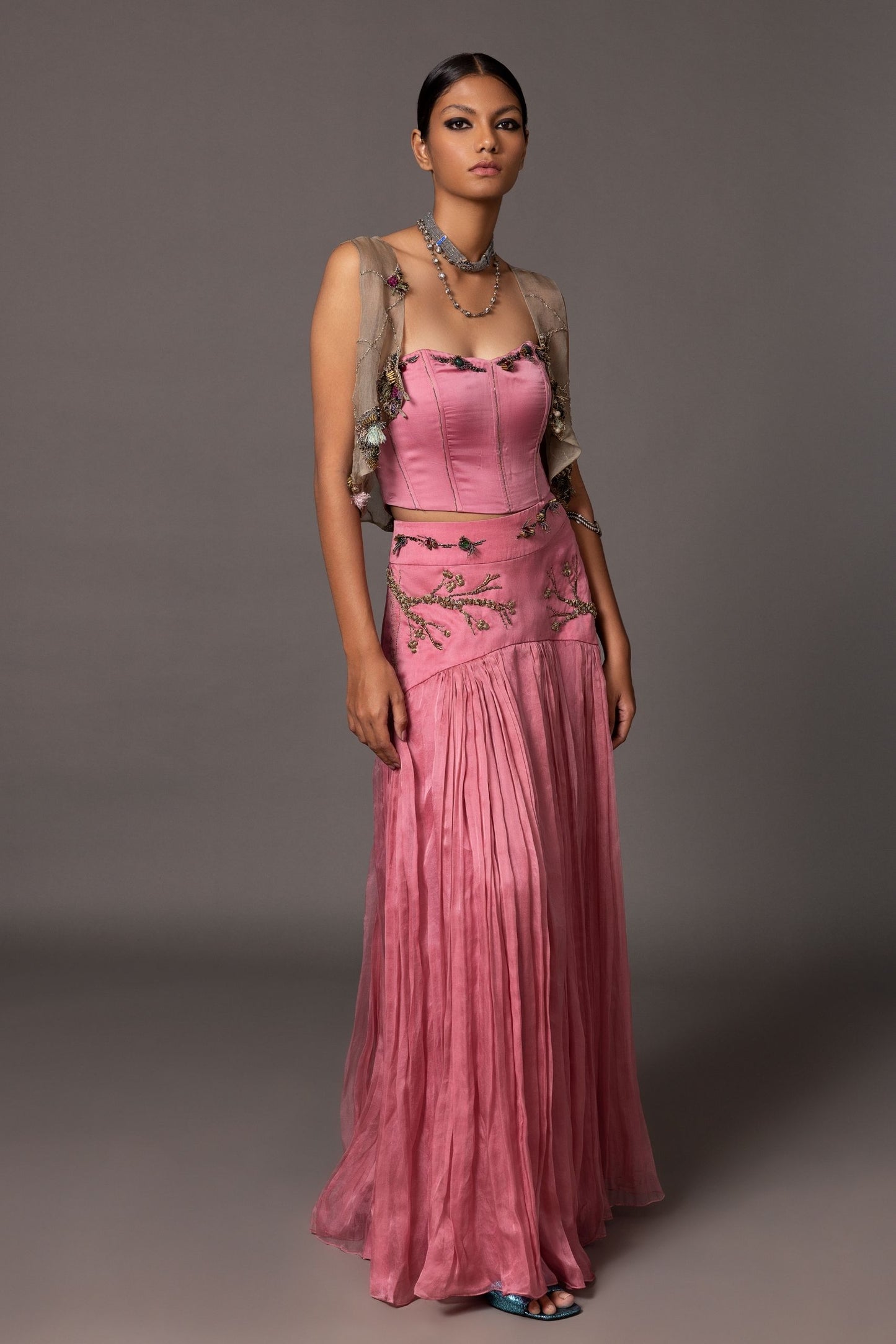 Luxurious Kaner Pink Corset Top & Skirt with embroidered jacket, featuring stone embroidery, beads, and delicate thread work, available at A Humming Way