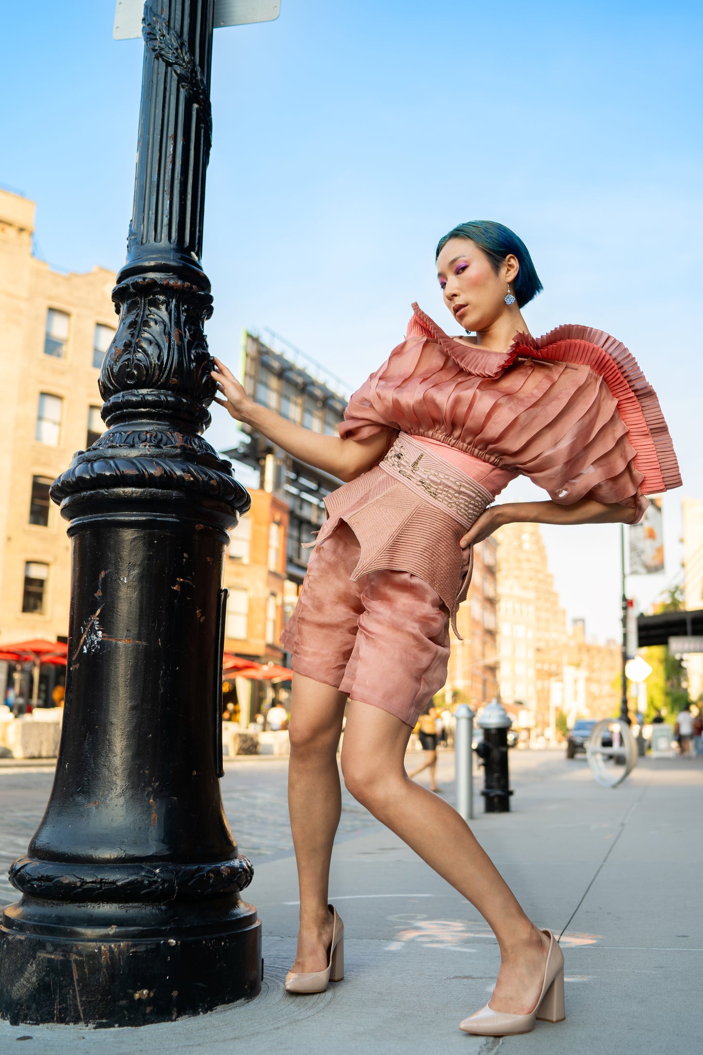 Front view of the designer mushroom top for women, showcasing the handmade pleatings and unique mushroom-inspired design in satin organza