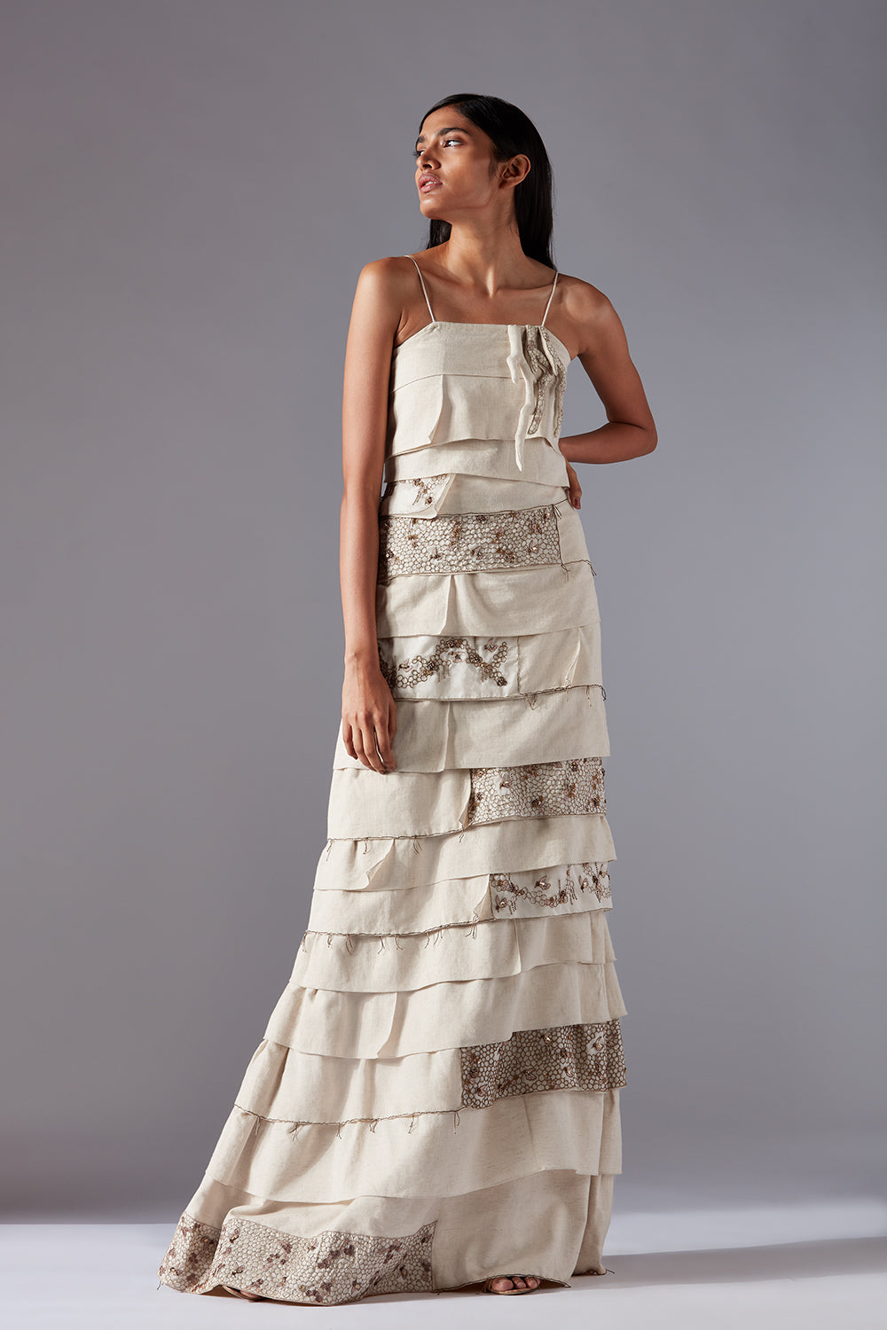 Designer gown for women featuring honeycomb handwork and sleek bandage design, crafted with organic khadi