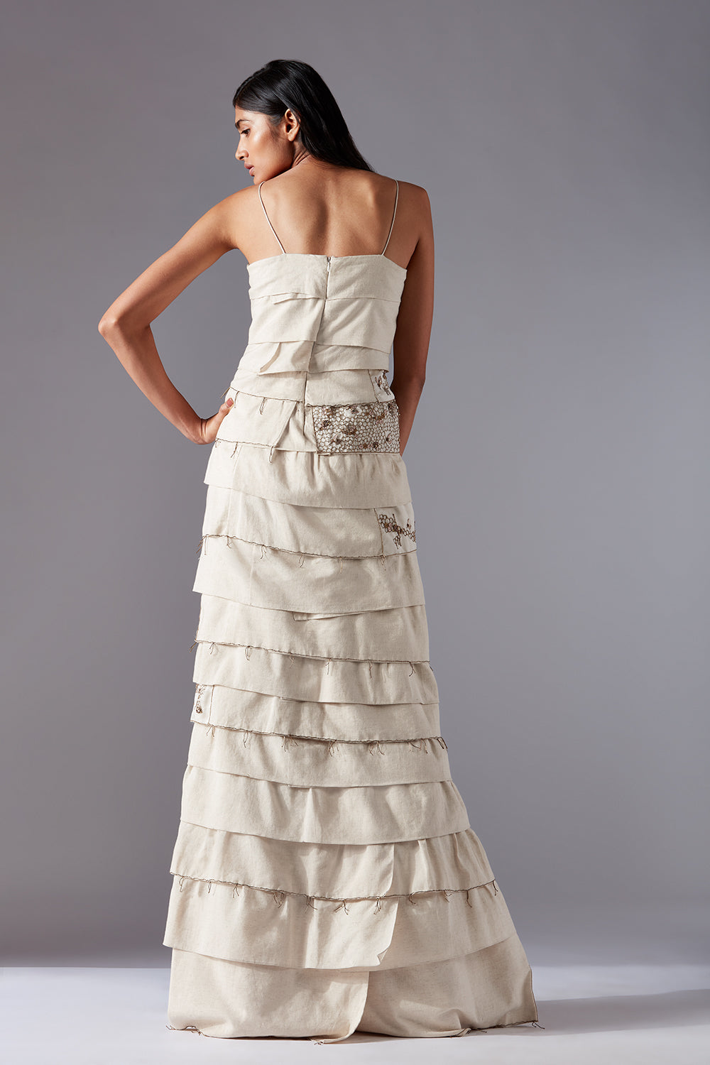 Back view of the designer gown for women, focusing on the luxurious organic khadi fabric and unique design