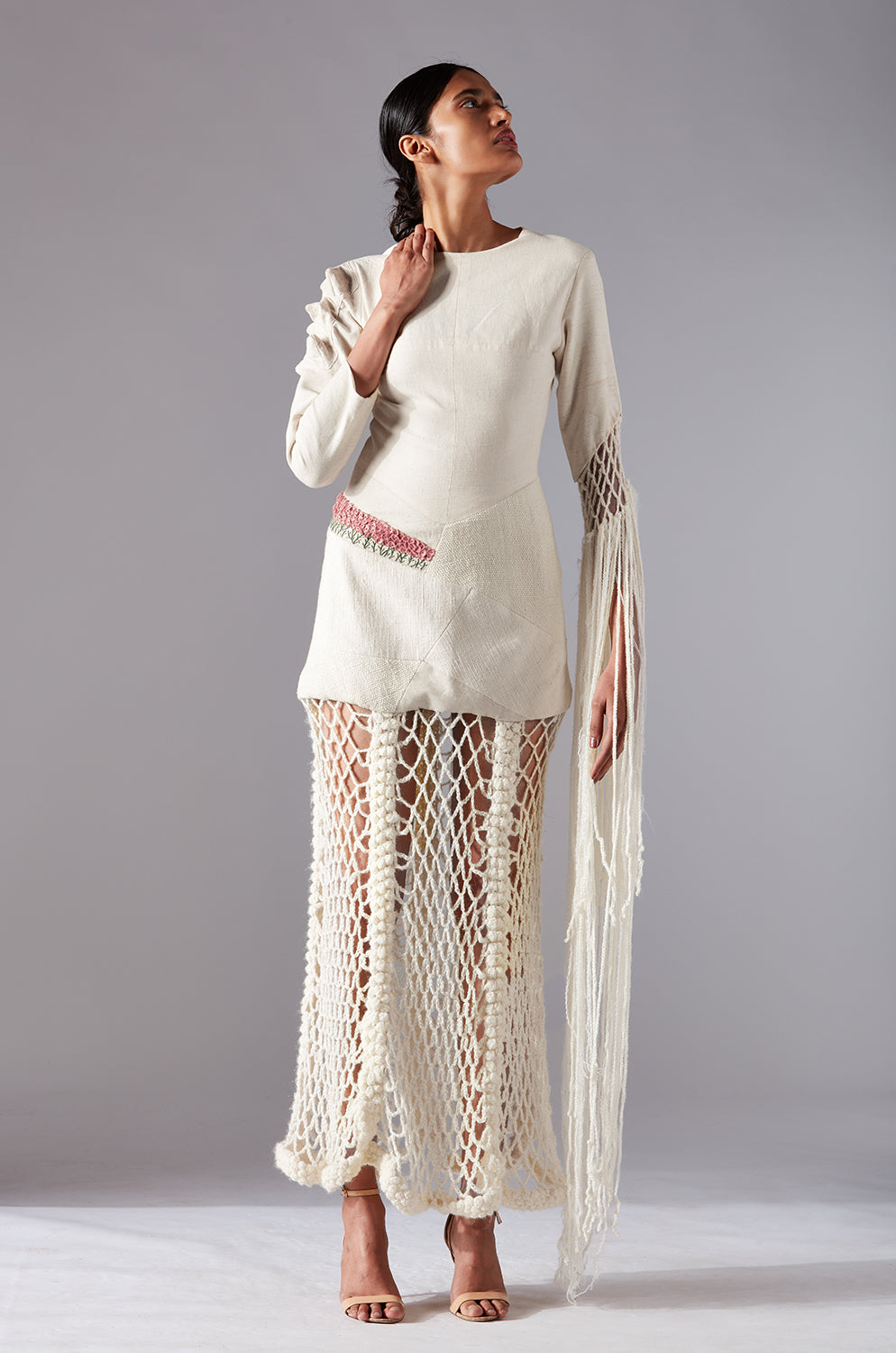 Collage Crochet Gown with textured khadi and hand-crochet flare, showcasing a modern designer white long dress for women