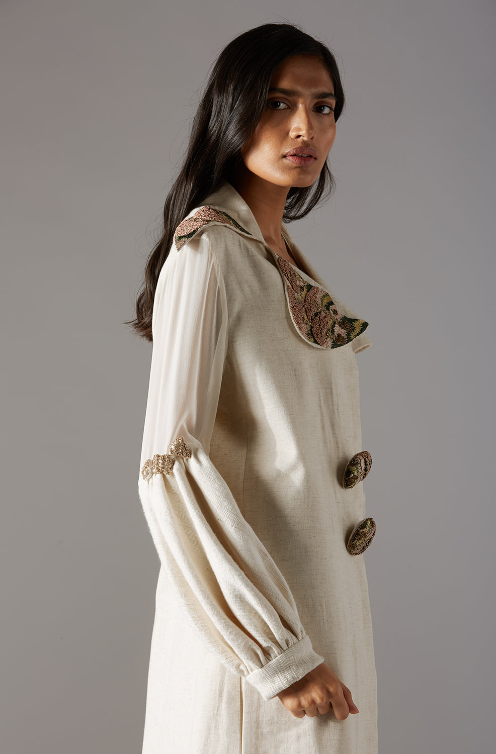 Side view of the elegant coat pant for women in khadi, creating a modern couture look