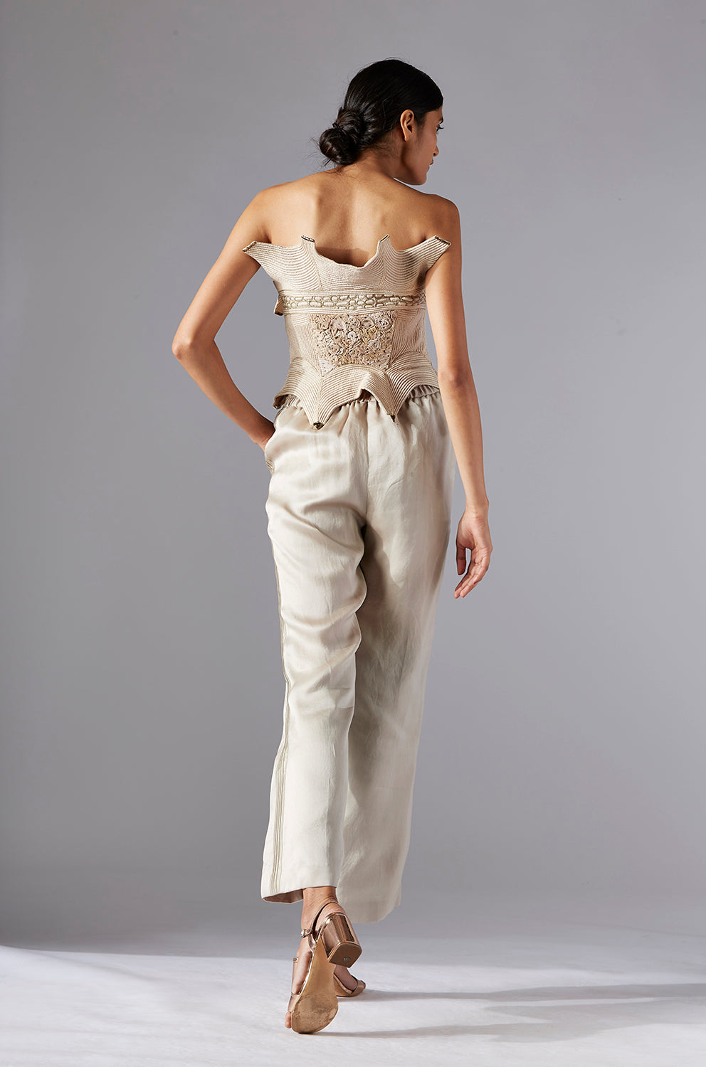 Back view of the Dune corset top, showcasing the fine details and seamless fit with organza pants