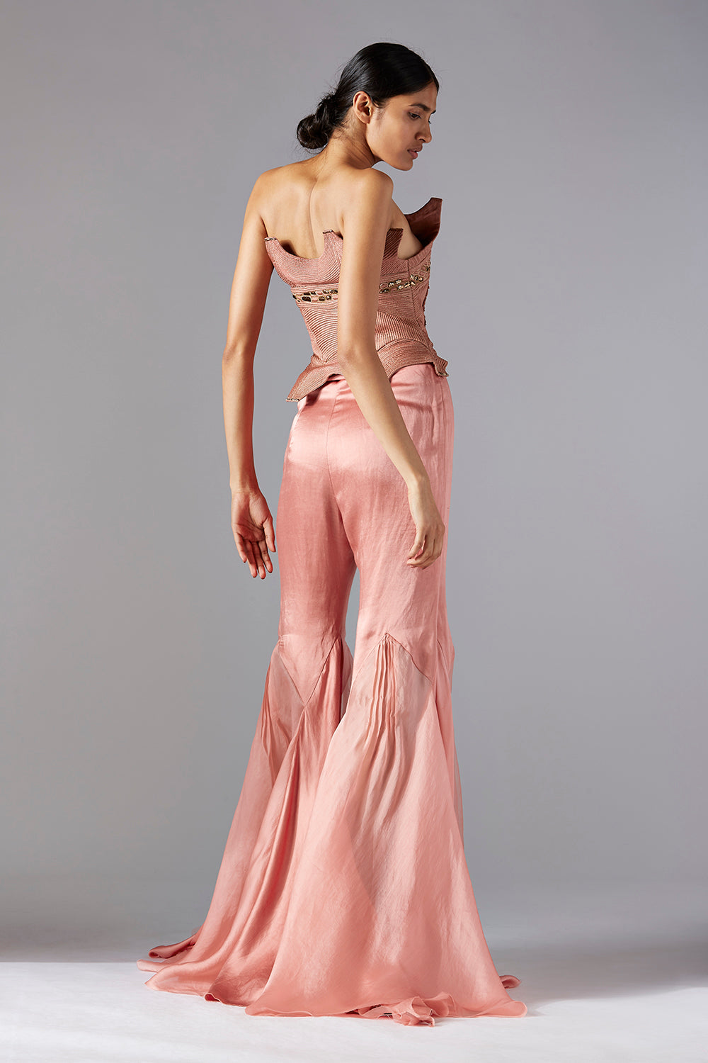 Back view of the Dune corset top and sharara set, showcasing the designer craftsmanship and flattering fit