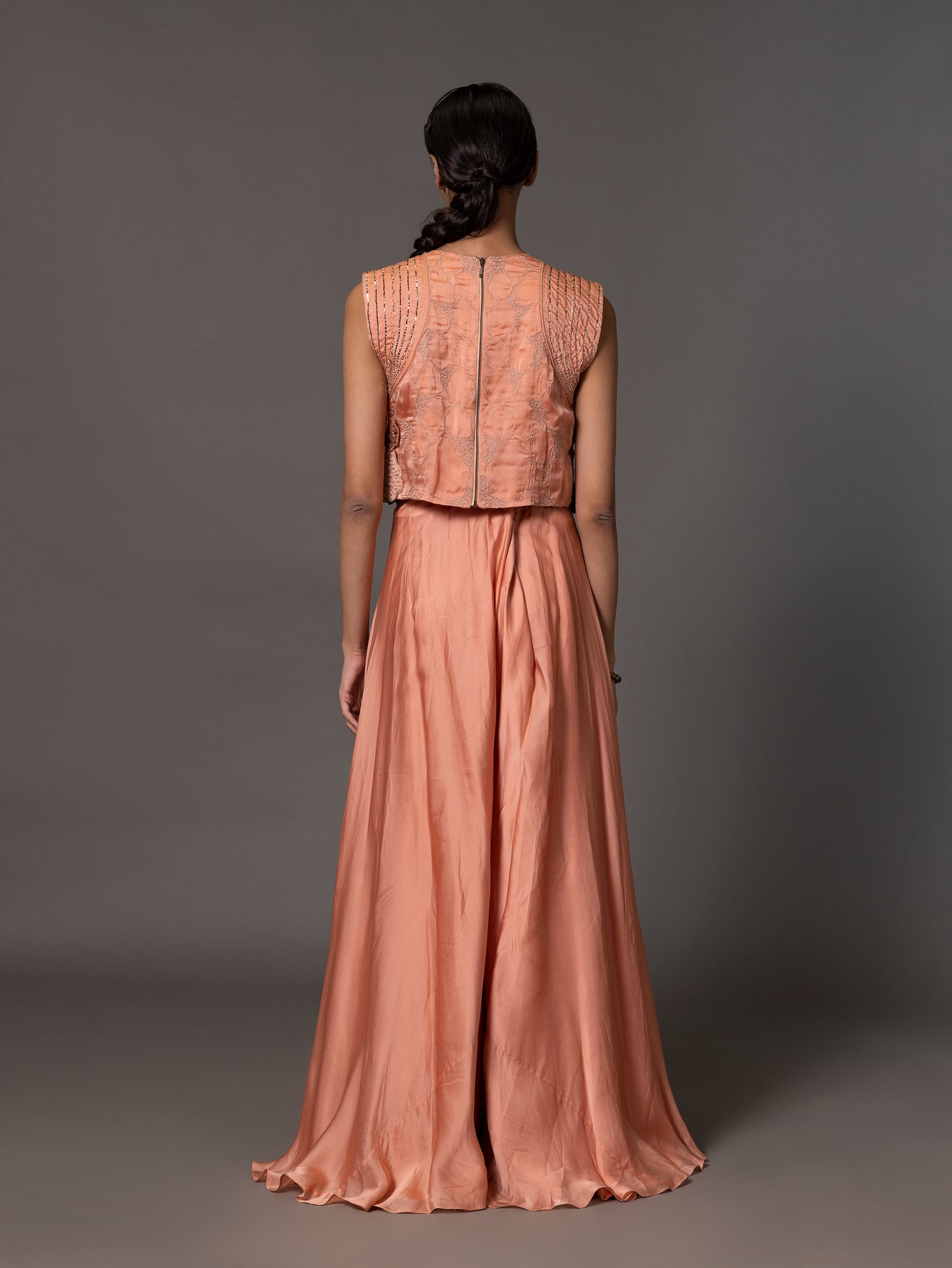 Back view of the Mima Mounds Pink Blouse and Flared Pant Set, showcasing the design and flow of the blouse and pants