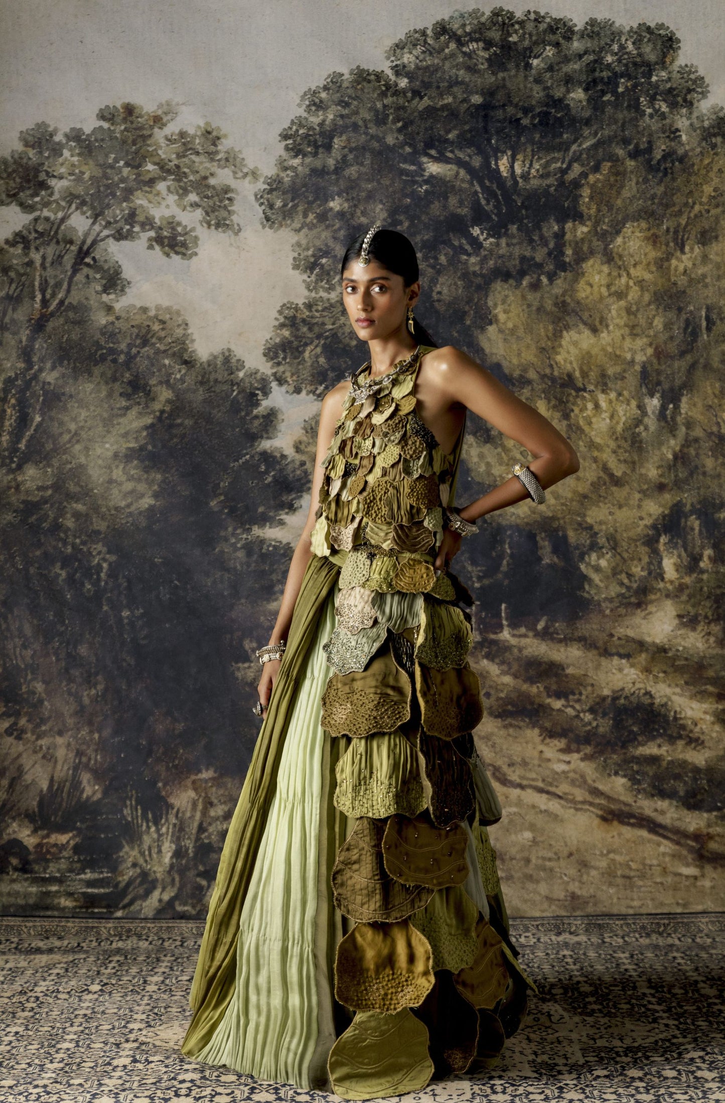 Designer lehenga set for women featuring 3D embroidered leaves, dual-hued pleats, and a handcrafted leaf belt