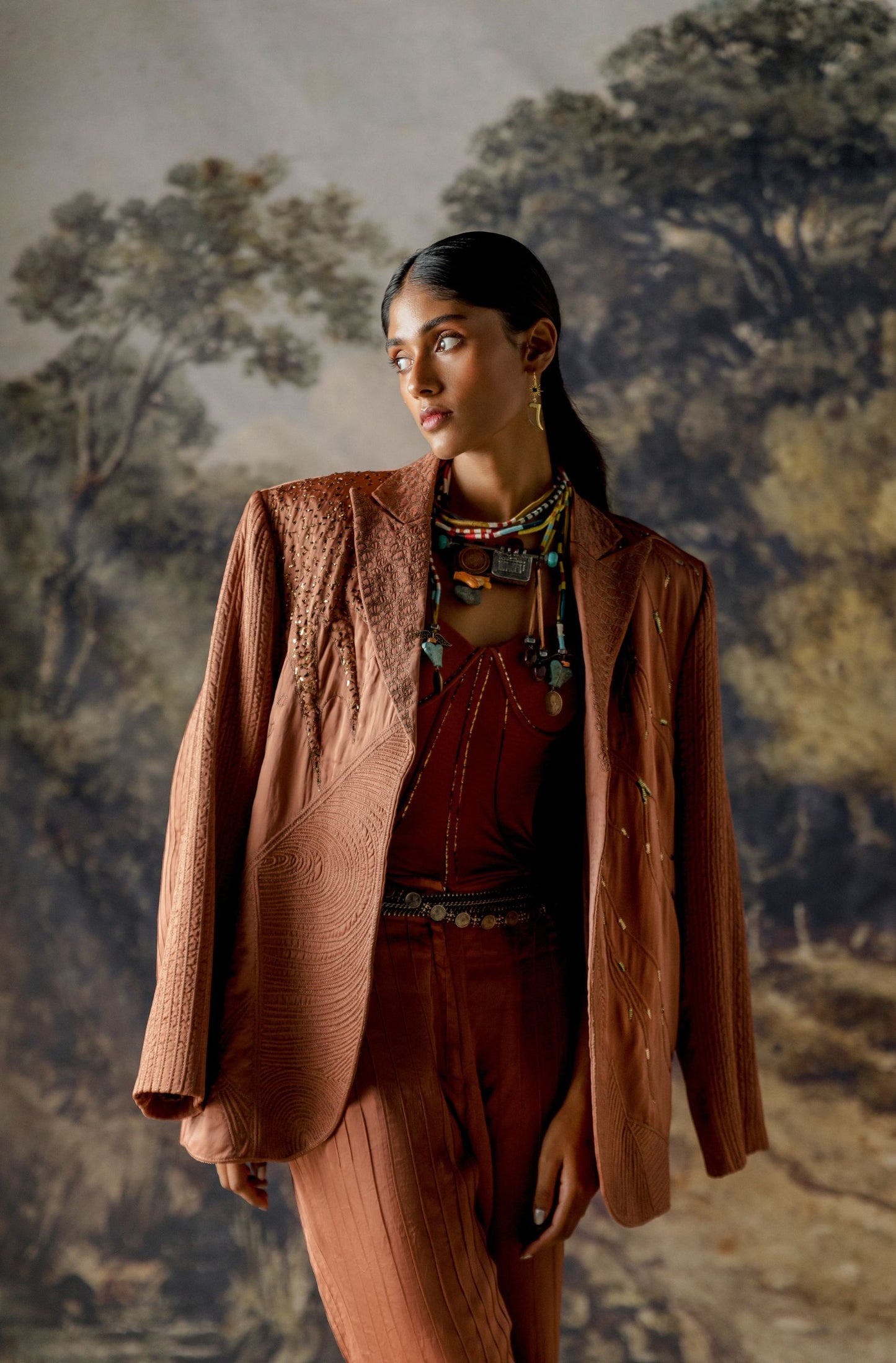 Focused shot on the embroidered corset and textured fabric of the Jaisalmer suit set