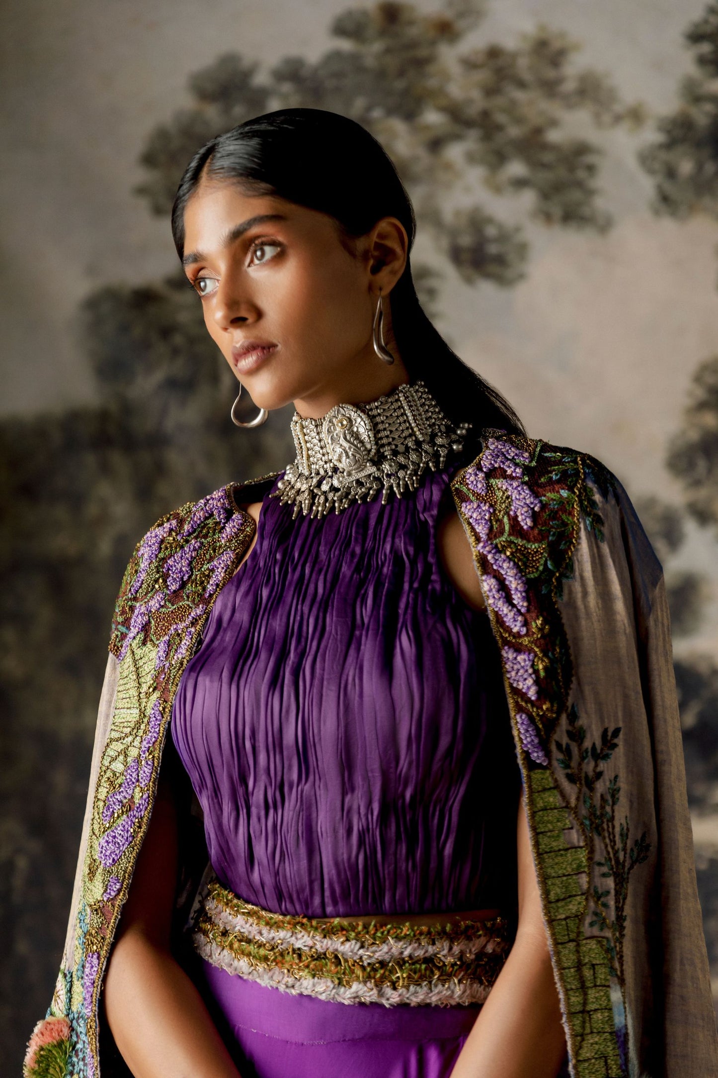 Focused view on the intricate hand-embroidery and fabric details of the Elysian Iris Lehenga Set