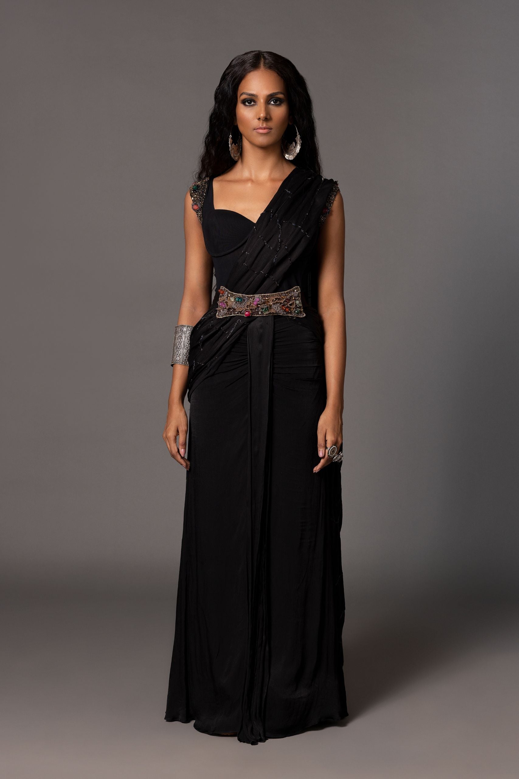 saree corset dress - IVELLE CORSET SAREE GOWN -, Featuring a meticulously designed corset bodice adorned with intricate embellishments, the ensemble is paired with a fluid saree-inspired drape that cascades gracefully