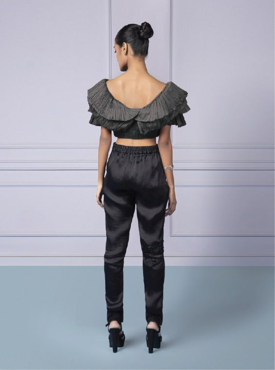 Back view of the Gill Fungi Top and Intemperate Pants set, showcasing the clean lines and flattering fit of the ruched top and stylish pants