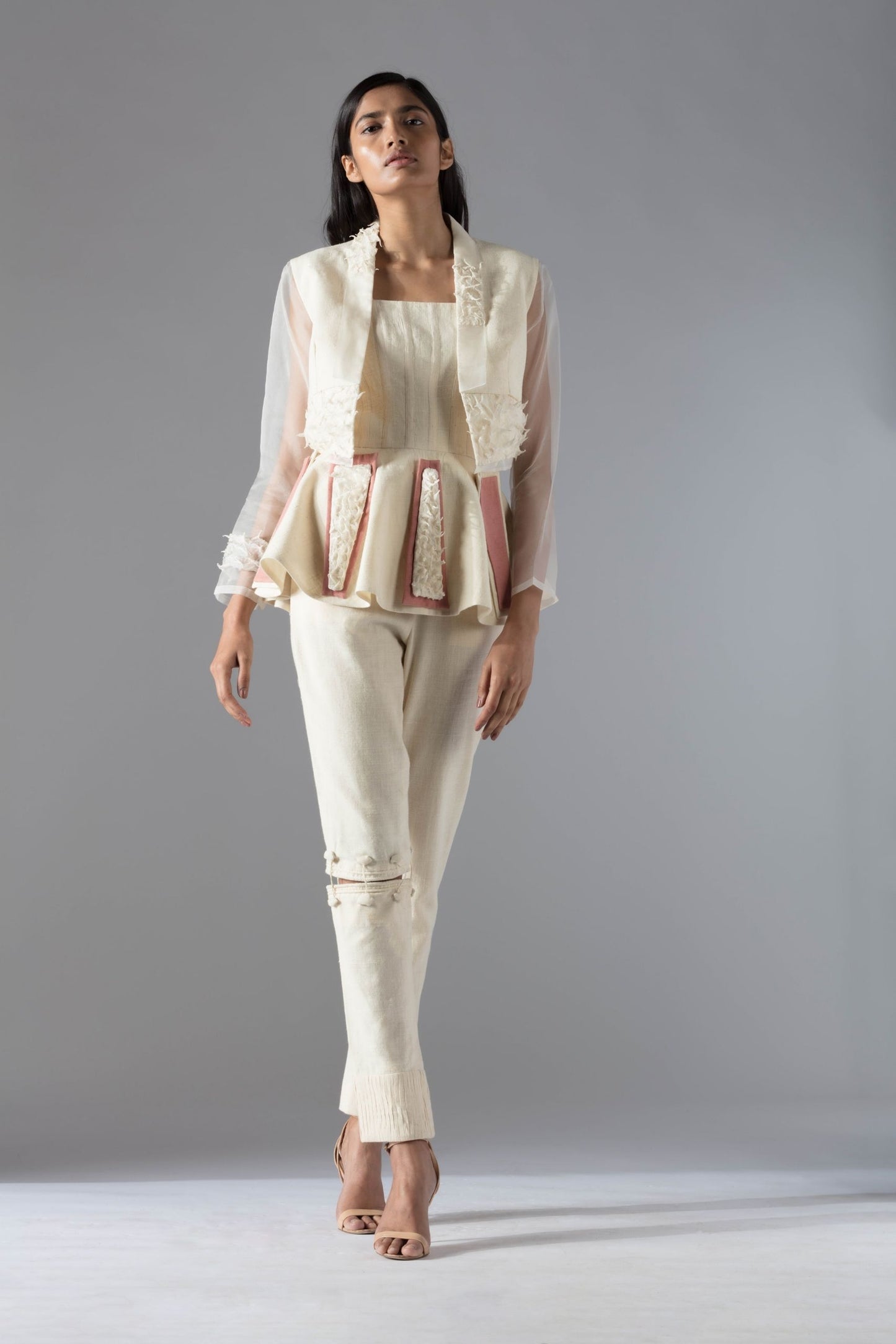 Chic peplum top and jacket pant set for women in organic khadi, featuring unique details for a stylish couture look