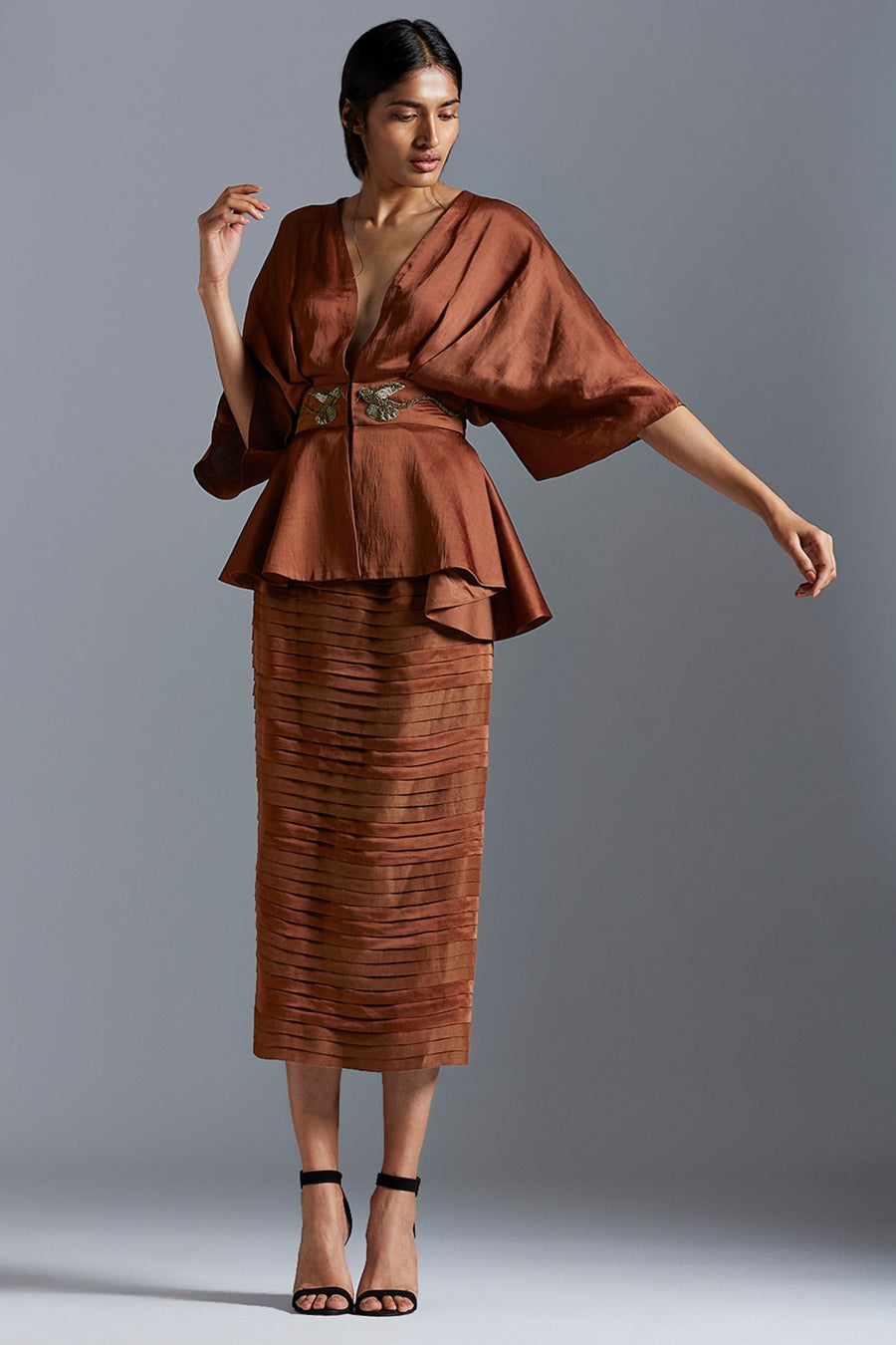 Kimono sleeve top and pleated skirt set for women with handmade embroidery, offering an elegant and sophisticated look