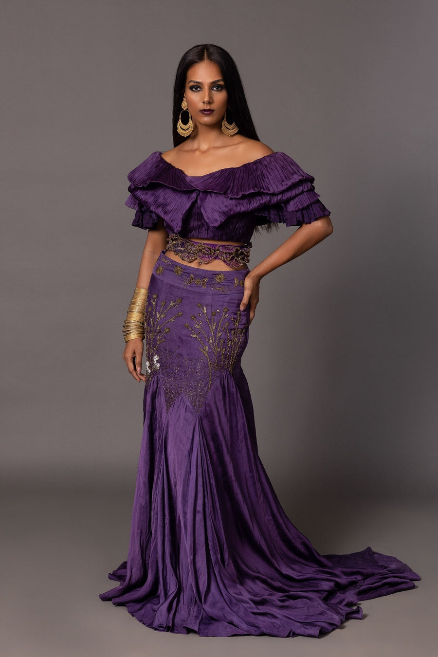 Purple Gill Fungi Textured Off-Shoulder Crop Top with layered ruching, paired with a designer long skirt featuring metallic embroidery, perfect for stylish women